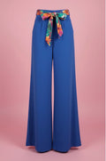 Pantalon large bleu royal avec ceinture fleurie